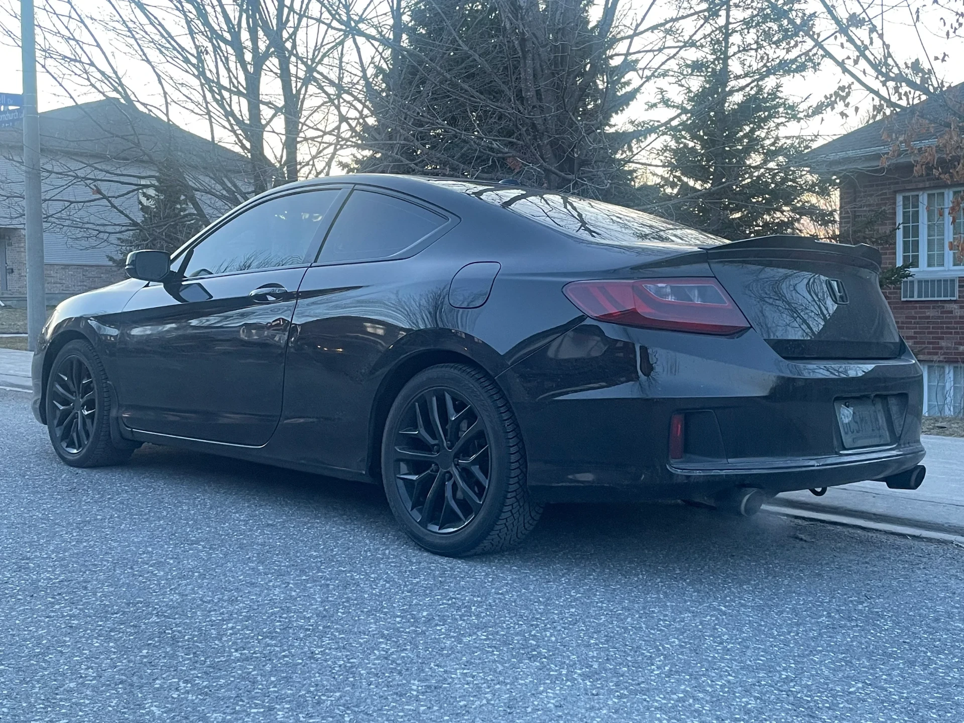 Blacked-out Honda Accord coupe with tinted windows